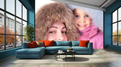 mother with child in furry hats Wall mural