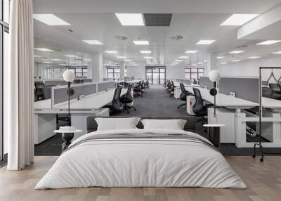 Modern corporate open office in minimalist modern design in whites and greys, empty office workstations. Wall mural