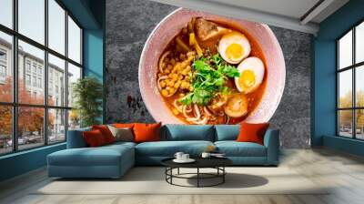 Asian noodle soup, ramen with chicken, tofu, vegetables and egg in bowl Wall mural