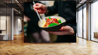 chef hand cooking donburi food in the restaurant kitchen Wall mural