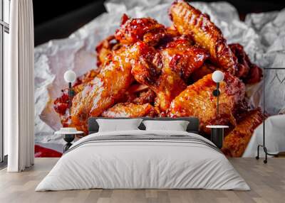 fried chicken wings with sweet chili sauce on white paper Wall mural