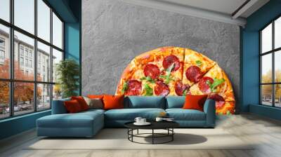 Pepperoni Pizza with Mozzarella cheese, salami, Tomato sauce, pepper, Spices and Fresh arugula. Italian pizza  on Dark grey black slate background Wall mural