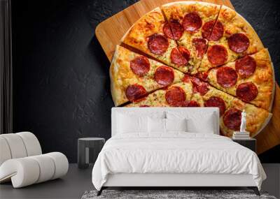 Pepperoni Pizza with Mozzarella cheese, salami, Tomato sauce, pepper, Spices. Italian pizza on Dark grey black slate background Wall mural