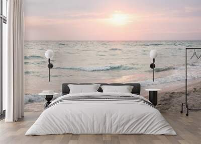 Sunset sea with beach Wall mural