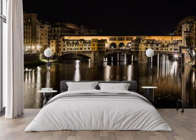 Arno river and Ponte Vecchio in Florence at night Wall mural