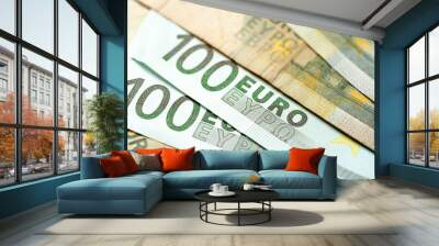 Two hundred euro bills lies in each other. Wall mural