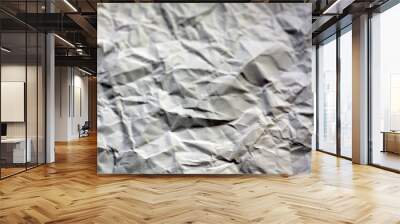 Crumpled sheet of paper with blur effect. Wall mural