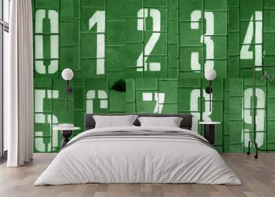 Numbers from zero to nine on pavement in green tone. Wall mural