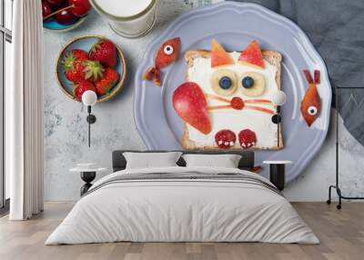 Toast with spread in a shape of cat, food for kids idea, top view Wall mural