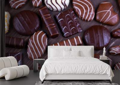  Composition of chocolate chip cookies of various shapes and chocolates top view Wall mural