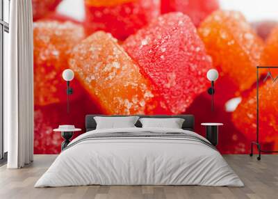 Red, yellow and orange jelly candies shot close up on a white background Wall mural