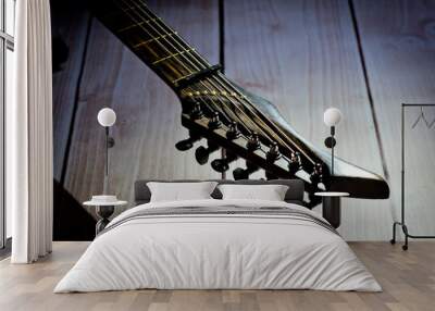 Seven-string electric guitar made of dark wood. Background for music and creativity. Wall mural