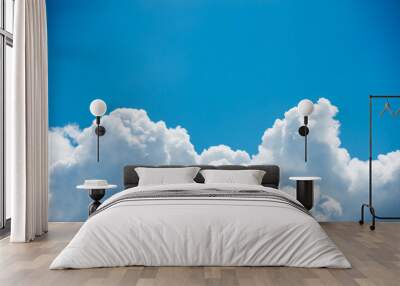 Beautiful pure white clouds on bright blue sky Wall mural