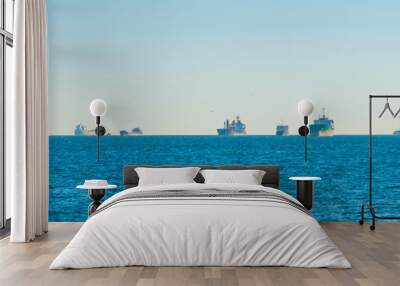 Many transport ships on blue sea, tanker cargo ships panorama Wall mural