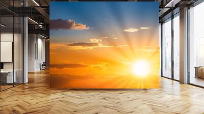 Sun rays on sunset sky with blue ond orange colorful sunset clouds Wall mural