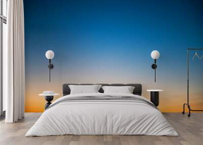 Sunset in the sky with blue, orange and red dramatic colors Wall mural