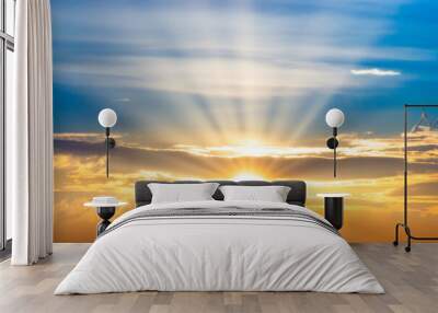 Sunset sky with sun rays and sunset clouds Wall mural