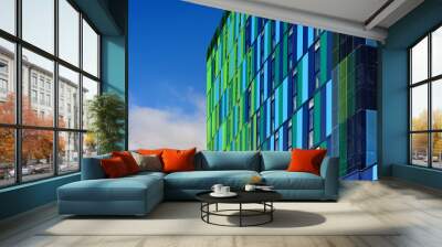 Glass colorful facade with cloudy sky Wall mural