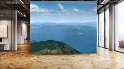 panorama of the mountains of the Montenegrin range from Mount Pip Ivan, silhouettes, aerial perspective, and the wall in the foreground Wall mural