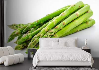 Fresh green asparagus stalks arranged on a white background Wall mural