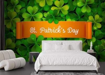 Saint Patricks Day card, ribbon on realistic shamrock leaves Wall mural