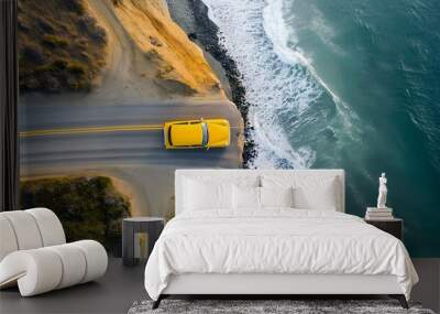 Pacific Coast Highway and coastline aerial view of yellow car Wall mural