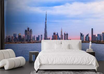 Skyline panorama of Dubai at sunset Wall mural