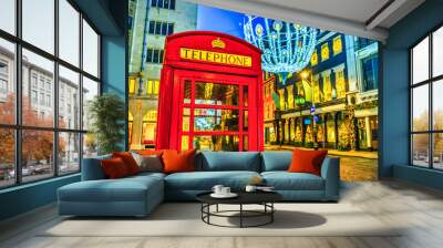 Traditional telephone box in Christmas at Bond Street in London. England Wall mural