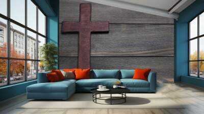 Wooden cross on wooden background Wall mural