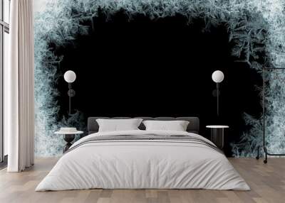 Frostwork. Decorative ice crystals frame on black matte background Wall mural