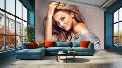 Portrait of beautiful blonde girl with long hair Wall mural