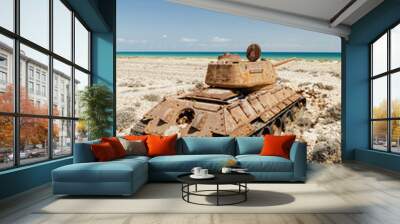 Old soviet tank in beach in Socotra Island Wall mural