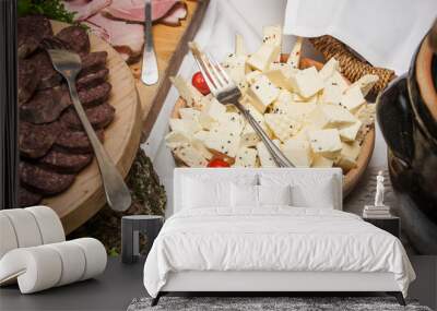 Cheese and meat snack catering table. Wedding in Poland food background.  Wall mural