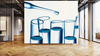 Chemistry background. Isolated test tubes filled with transparent fluid. Wall mural