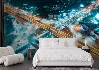 Aerial view highway road intersection at dusk for transportation, distribution or traffic background. Wall mural