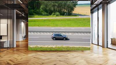 Cars driving at high speed along the highway Wall mural