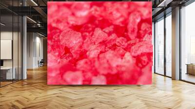 Red crystals minerals bath salts close-up. Macro photo Wall mural