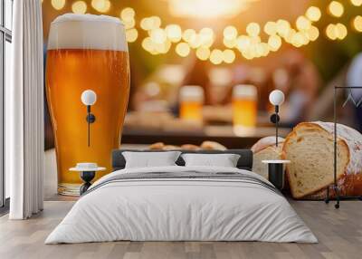 Refreshing beer with bread and snacks on a wooden table with lights in background. Wall mural