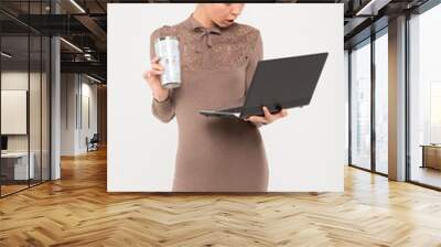 portrait of businesswoman with notebook and cup Wall mural