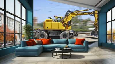 Yellow Bulldozer in movement on construction site Wall mural