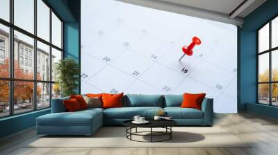 Red pin on the 15th day on the calendar. Business planning concept. Wall mural