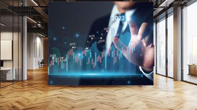  Businessman draws increase arrow graph corporate future growth year 2022. business strategy. New Goals, Plans, and Visions for Next Year 2022.Development to success and growth business concept. Wall mural