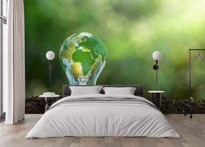 Renewable Energy.Environmental protection, renewable, sustainable energy sources. The green world map is on a light bulb that represents green energy Renewable energy that is important to the world Wall mural