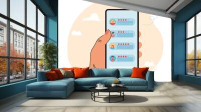 Hand holding huge smartphone with bubble speeches and stars on screen. Rating and reviewing customer service flat vector illustration. Feedback concept for banner, website design or landing web page Wall mural