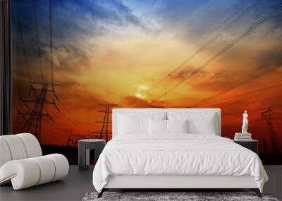 Electric tower, silhouette at sunset Wall mural