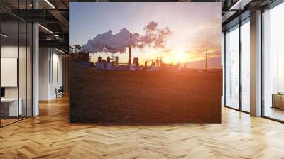 Industrial plant equipment in the sunset Wall mural