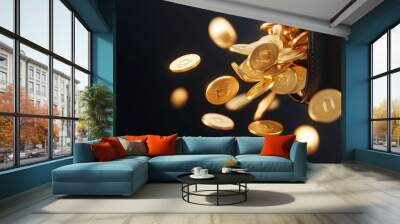 A cascade of golden coins spills from a black container, creating a visually striking scene of abundance and wealth. Wall mural