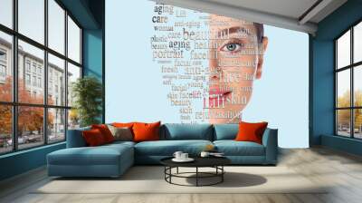 Beauty woman face with word on face showing cosmetology and aesthetic medicine concept. Advertising lifting face skin, on blue background Wall mural