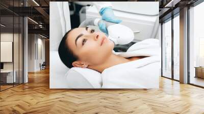 ELOS rejuvenation technology for removes brown spots. Procedure of skin rejuvenation Wall mural