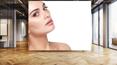 portrait of beautiful woman with perfect skin of the face, with arrows on face, concept of lifting skin. Cosmetology, elastic and young skin of the face. Wall mural